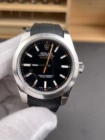 A black-dial Rolex mechanical watch. Is this the style you like?